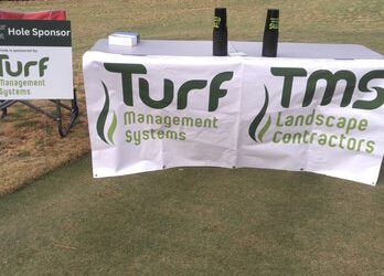 The Turf Management Systems sponsorship table at local golf course